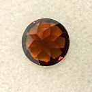 Zirkon kraftig refleksjon og rød farge 2,3 ct og 7 mm i diameter thumbnail