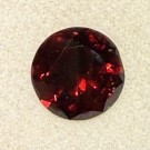 Zirkon med fantastisk rød farge og refleksjon. Diamter ø 6,2 og 1,35ct thumbnail